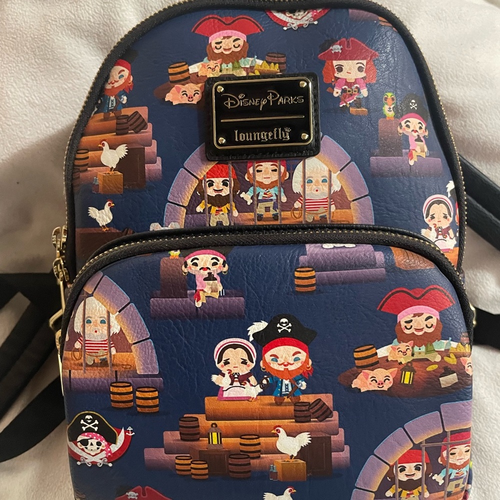 Pirates of the Caribbean Loungefly mini backpack. EUC